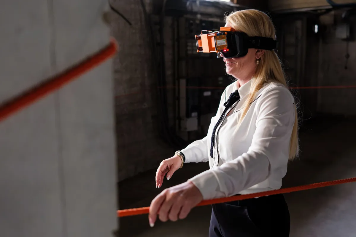 A participant wearing the Radar Vision goggles while partaking in the laid out parkour to experience this form of sensing.